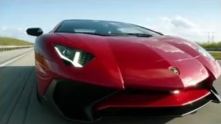 red Lamborghini Huracan driving on highway — Sports Cars