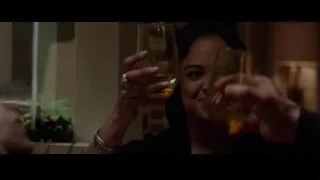 Hands holding glass of beer in living room — Creed
