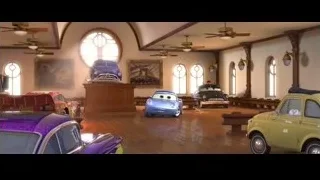 colorful cars on display in large room — Cars