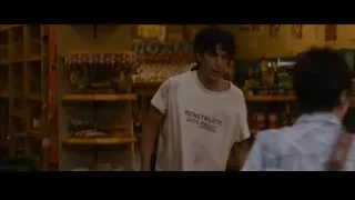young man in store holding mop — The Dictator