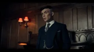 Man in suit in dimly lit wooden room — Peaky Blinders