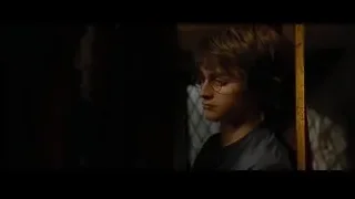 young boy standing in dimly lit room — Harry Potter and the Goblet of Fire
