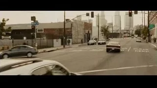 red vintage car driving on city street — Furious Seven