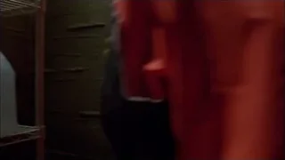 red valve on green brick wall — Breaking Bad