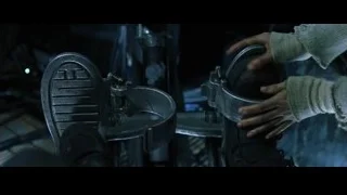 bandaged hand resting on metal object — The Matrix