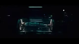 person lying on stretcher in dark medical room — Deadpool