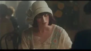 Woman in white hat sitting at table — Peaky Blinders