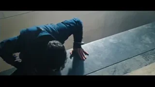 man crouching in subway station — Doctor Strange 2