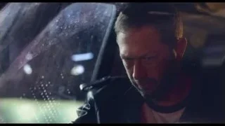 distressed man in back of car — The Bear