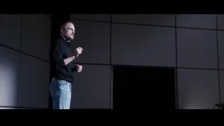 man giving presentation on stage — Jobs