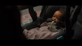 baby sitting in car seat — Creed 2