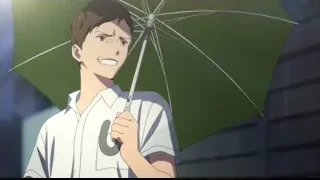 Young man with green umbrella looking worried — I Want To Eat Your Pancreas