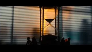 hourglass with sand by window cityscape — John Wick: Chapter 4