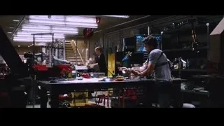 people working in a workshop — Iron Man
