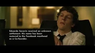 Young man at desk with laptop — The Social Network