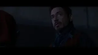 close-up of man's face in dark room — Iron Man 3