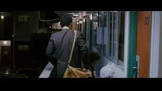 Man and boy on balcony at night — The Persuit of Happyness