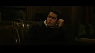 man sitting thoughtfully in dimly lit room — The Social Network