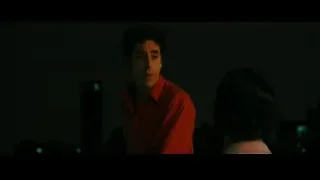 Young man looking serious in dimly lit room — The Dictator