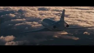 airplane flying above clouds at sunset — Now You See Me