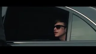 young man in sunglasses looking out car window — The Amazing Spider Man 2
