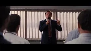 man giving presentation in conference room — The Wolf Of Wall Street