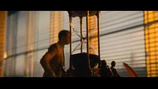man in suit looking out window — John Wick: Chapter 4
