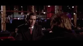 Man in suit looking at woman in restaurant — American Psycho