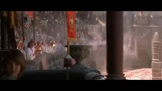 boy and woman on balcony overlooking crowd — Gladiator
