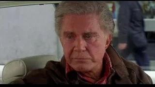 Elderly man in car with serious expression — Spider Man