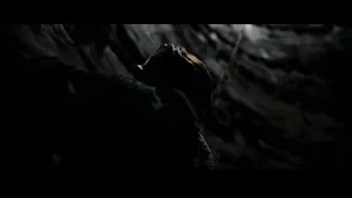 Person in dark tunnel with light — Batman: The Dark Knight Rises