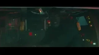 Man in dimly lit room with electronics — Furious Seven