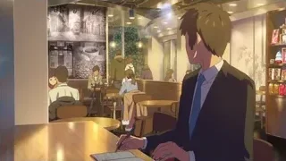 Man writing in notebook at restaurant — Your Name