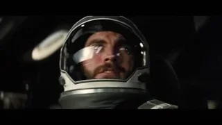 man's face in white space helmet — Interstellar