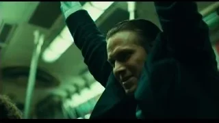 Man shouting with arms raised in dark room — Joker