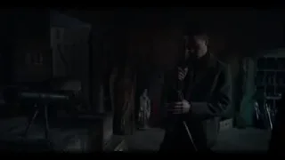Young man holding gun in dark room — Peaky Blinders