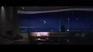 living room with ocean view at night — Iron Man