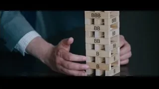 two men in suits conversing in office — The Big Short