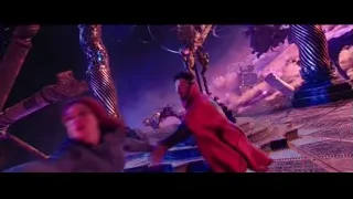 man and woman battling near dragon statue — Doctor Strange 2