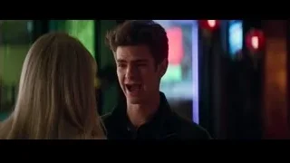 man and woman in dimly lit bar — The Amazing Spider Man 2