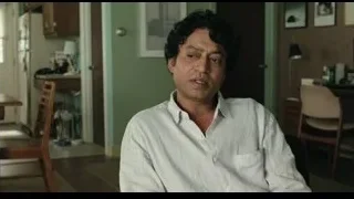 middle-aged man sitting in living room — Life of Pi