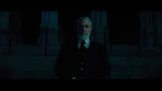 elderly man in dimly lit room with trophy — John Wick: Chapter 4