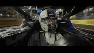 person in race car cockpit with helmet — F1