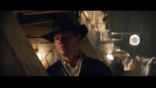 Man in cowboy hat in dimly room — Ford v Ferrari
