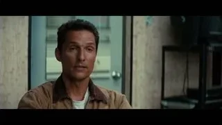 man in brown jacket looking at camera — Interstellar
