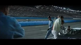 man in jumpsuit and helmet at stadium — Ford v Ferrari