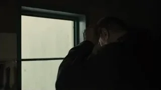 man standing by open window in dark room — Blade Runner 2049