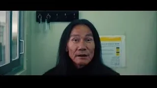 elderly Asian man in room with green wall — The Secret Life of Walter Mitty