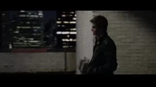 man and woman on rooftop at night — The Amazing Spider Man