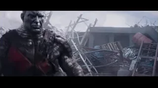 Deadpool crouching in rubble and debris — Deadpool